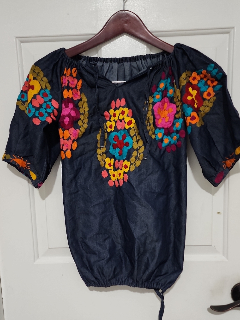 Embroidered Peasant Top in Navy with Multicolor Floral Motifs